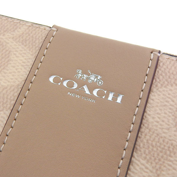 コーチ ポーチ レディース アウトレット サンドトープ コーナージップ リストレット シグネチャー キャンバス ストライプ CRN ZIP SIG LTH STRP CW854SVPWH COACH